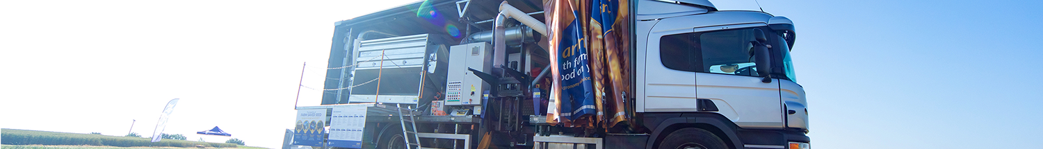 Mobile seed cleaning and dressing